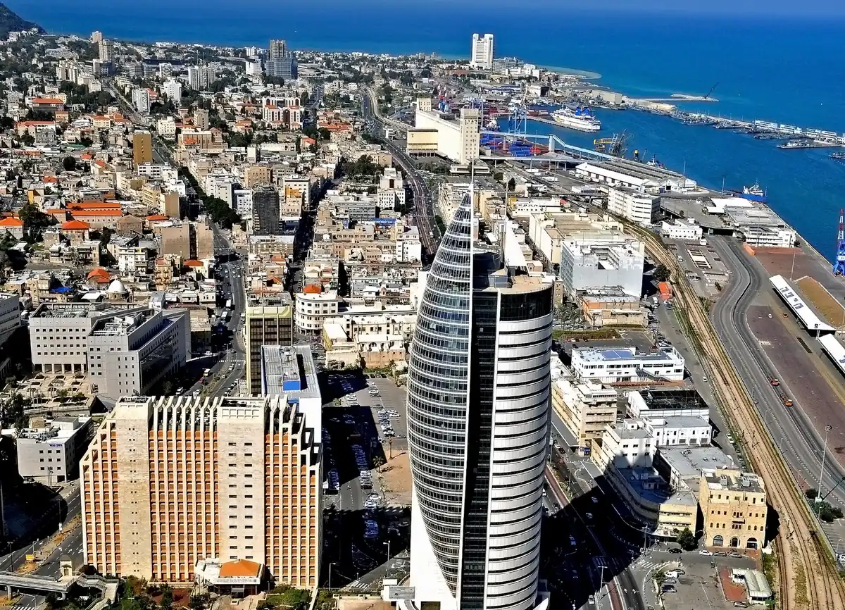Aerial view of Downtown Haifa with the Sail Tower, the port and the bay